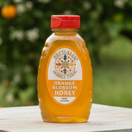 Orange blossom honey in a 1 lb container.