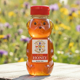 Wildflower honey in a 12 oz. honey bear container