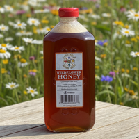 Wildflower honey in a 5 pound container
