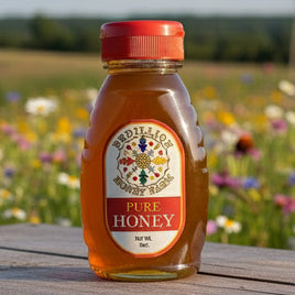 Wildflower honey in 8 oz. container
